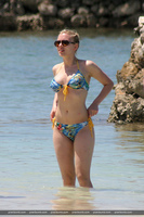 Scarlett Johansson frolics in a bikini