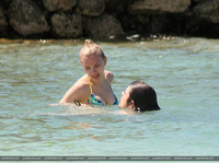 Scarlett Johansson frolics in a bikini