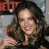 Alessandra Ambrosio exposed holds her yellow leopard bra