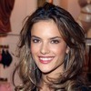 Alessandra Ambrosio exposed holds her yellow leopard bra