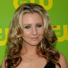 Beverley Mitchell exposed her cleavage in a black dress