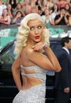 Christina Aguilera exposed her cleavage in a silver dress