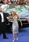 Christina Aguilera exposed her cleavage in a silver dress