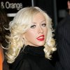 Christina Aguilera exposed her bra and panties in a sheer dress