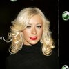 Christina Aguilera exposed her bra and panties in a sheer dress
