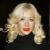 Christina Aguilera exposed her bra and panties in a sheer dress