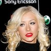 Christina Aguilera exposed her bra and panties in a sheer dress