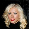 Christina Aguilera exposed her bra and panties in a sheer dress