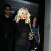 Christina Aguilera exposed her bra and panties in a sheer dress