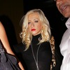 Christina Aguilera exposed her bra and panties in a sheer dress