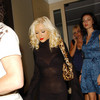 Christina Aguilera exposed her bra and panties in a sheer dress