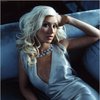 Christina Aguilera exposed her lingerie and cleavage in a photoshoot