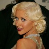 Christina Aguilera exposed her plunging cleavage in a sparkling dress