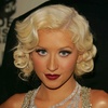 Christina Aguilera exposed her plunging cleavage in a sparkling dress