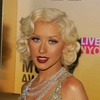 Christina Aguilera exposed her plunging cleavage in a sparkling dress