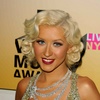 Christina Aguilera exposed her plunging cleavage in a sparkling dress