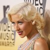 Christina Aguilera exposed her plunging cleavage in a sparkling dress