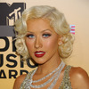 Christina Aguilera exposed her plunging cleavage in a sparkling dress