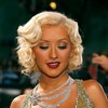 Christina Aguilera exposed her plunging cleavage in a sparkling dress