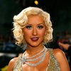 Christina Aguilera exposed her plunging cleavage in a sparkling dress