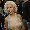 Christina Aguilera exposed her plunging cleavage in a sparkling dress