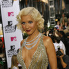 Christina Aguilera exposed her plunging cleavage in a sparkling dress