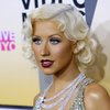 Christina Aguilera exposed her plunging cleavage in a sparkling dress