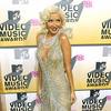 Christina Aguilera exposed her plunging cleavage in a sparkling dress