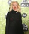 Christina Aguilera exposed her sexy red bra again in a see through sweater