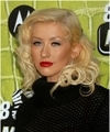 Christina Aguilera exposed her sexy red bra again in a see through sweater