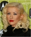 Christina Aguilera exposed her sexy red bra again in a see through sweater