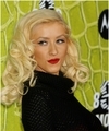 Christina Aguilera exposed her sexy red bra again in a see through sweater
