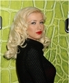 Christina Aguilera exposed her sexy red bra again in a see through sweater