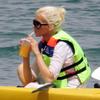 Christina Aguilera exposed her bikini in a see through shirt