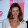 Elizabeth Hurley exposed her plunging cleavage in a white dress