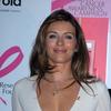 Elizabeth Hurley exposed her plunging cleavage in a white dress