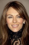 Elizabeth Hurley exposed her sexy bra in a lace shirt