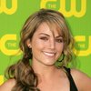 Erica Durance exposed her plunging cleavage in a black dress