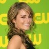 Erica Durance exposed her plunging cleavage in a black dress