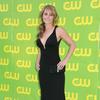 Erica Durance exposed her plunging cleavage in a black dress