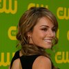 Erica Durance exposed her plunging cleavage in a black dress