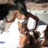 Eva Longoria exposed her pokies in a white bikini