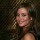 Holly Valance exposed her round cleavage in a tank top