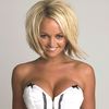 Jennifer Ellison exposed her round cleavage in a photoshoot