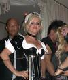 Jenny Mccarthy exposed her cleavage in a sexy maid halloween costume