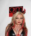 Jesse Capelli exposed her cleavage in a sexy latex halloween costume