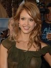 Jessica Alba exposed her boobs in a see through green dress