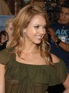 Jessica Alba exposed her boobs in a see through green dress