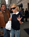 Jessica Simpson exposed her white bra in a see through sweater