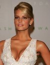 Jessica Simpson exposed her cleavage in a low cut dress